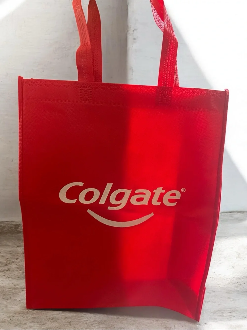 NWOT Colgate Red Logo Tote Bag with 2 clippers.